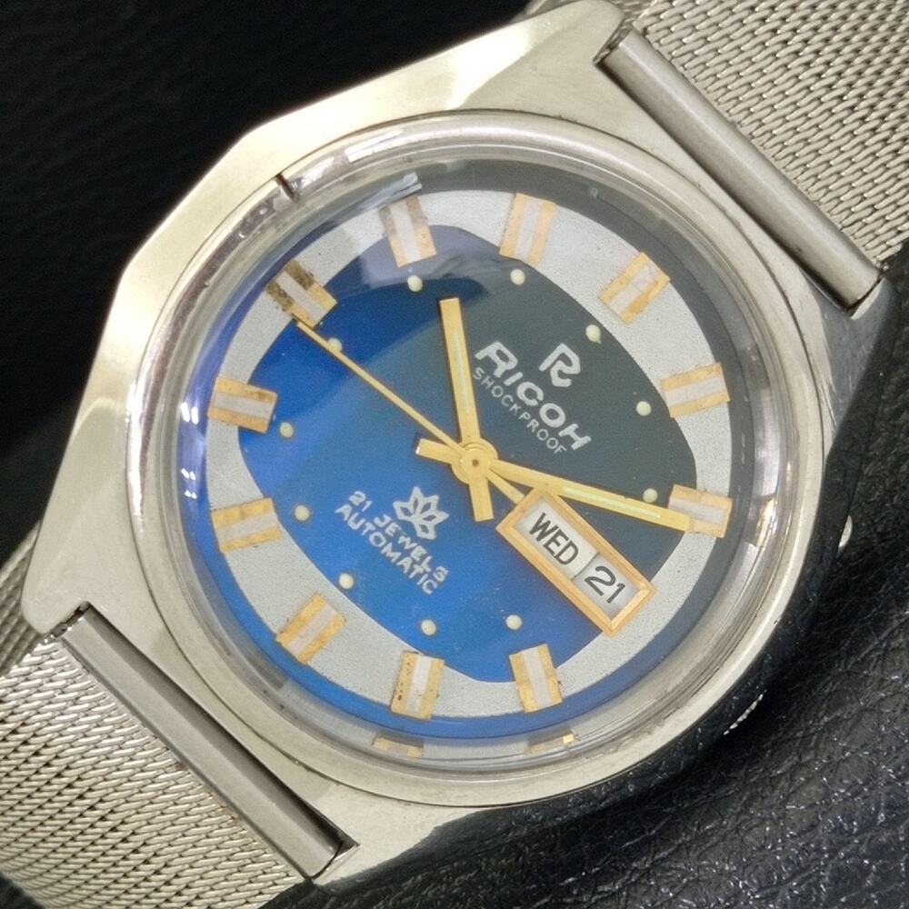 Vintage 1986 Ricoh Automatic Mens Silver Watch W/daydate & Blue accents